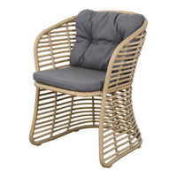 Natural rattan chair with gray cushions and a stylish slatted design. Perfect for contemporary seating.