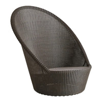 Textured dark gray wicker chair with a unique curved silhouette, perfect for modern interior decor.