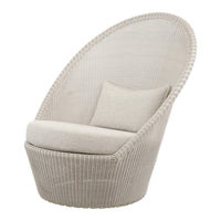 Curved beige chair with textured woven pattern and matching cushion, perfect for stylish, contemporary decor.