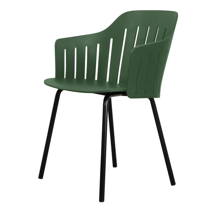 Green plastic chair with slatted back design and black metal legs, perfect for modern decor.