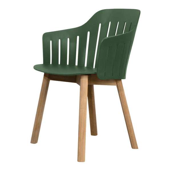 Green patterned chair with wooden legs, featuring a modern slatted design for stylish seating.