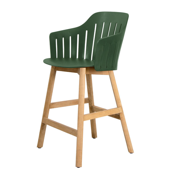 Green slatted chair with natural wood legs, combining a modern style with a fresh color palette for any decor.
