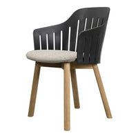 Stylish black and gray chair with wood legs and a textured beige seat cushion. Modern design with clean lines.
