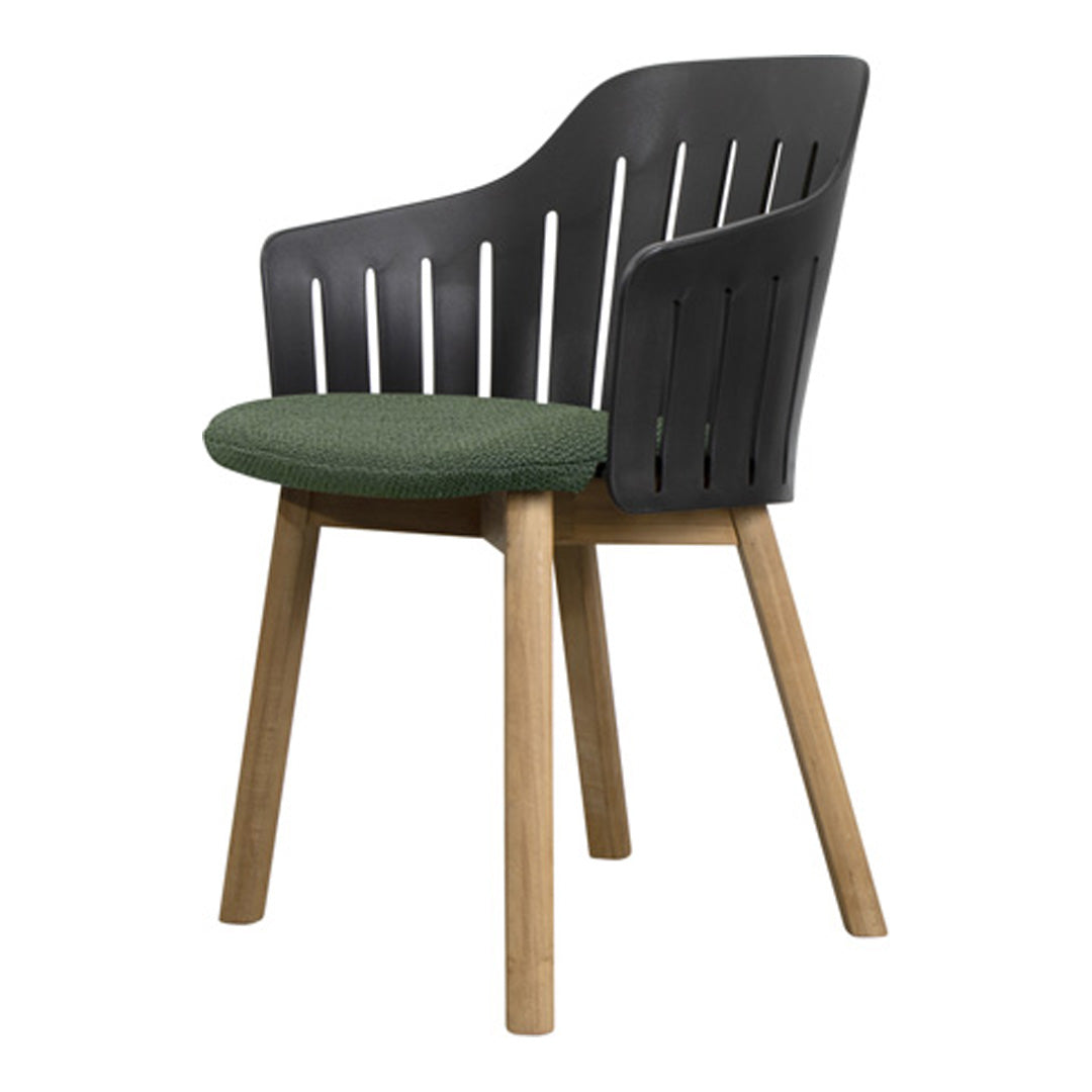 Stylish chair featuring a sleek black backrest, green cushion, and natural wood legs for a modern look.