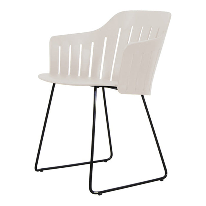Light beige slat-back chair with sleek black metal legs, perfect for modern decor.