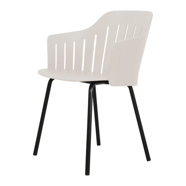 Light beige armchair with slatted back design and sleek black metal legs. Perfect for modern indoor or outdoor settings.