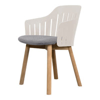White wooden chair with a gray upholstered seat and natural wood legs, showcasing a modern and minimalist design.