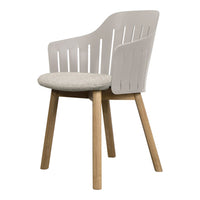 White slatted back chair with light gray upholstered seat and natural wooden legs, featuring a modern design.