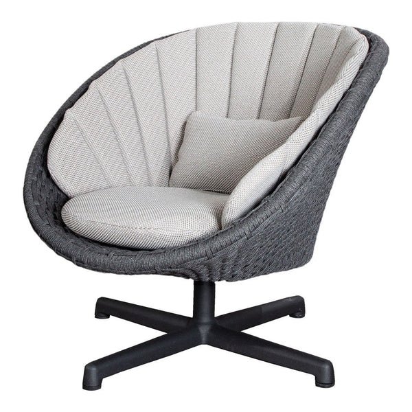 Gray woven chair with soft cream cushions and elegant vertical stitching, perfect for modern decor.