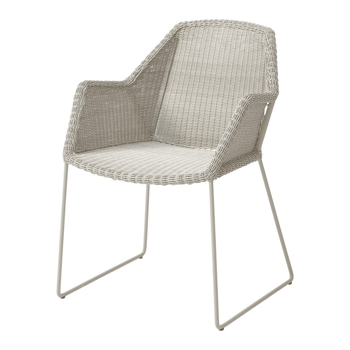 Light gray woven outdoor chair with subtle textured pattern and sleek metal frame. Perfect for stylish patio decor.
