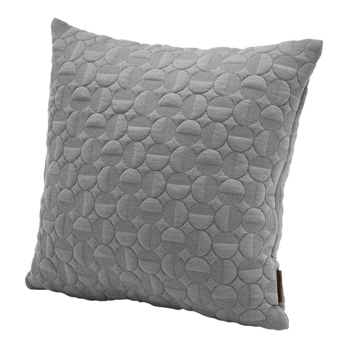 Gray decorative pillow featuring a textured pattern of overlapping circles. Elegant and modern home accent.
