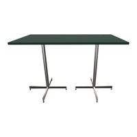 Green tabletop with a smooth finish and sleek silver metal legs, perfect for modern dining or workspace.