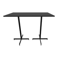Black rectangular table with sleek black metal legs, showcasing a minimalistic design and modern aesthetic.