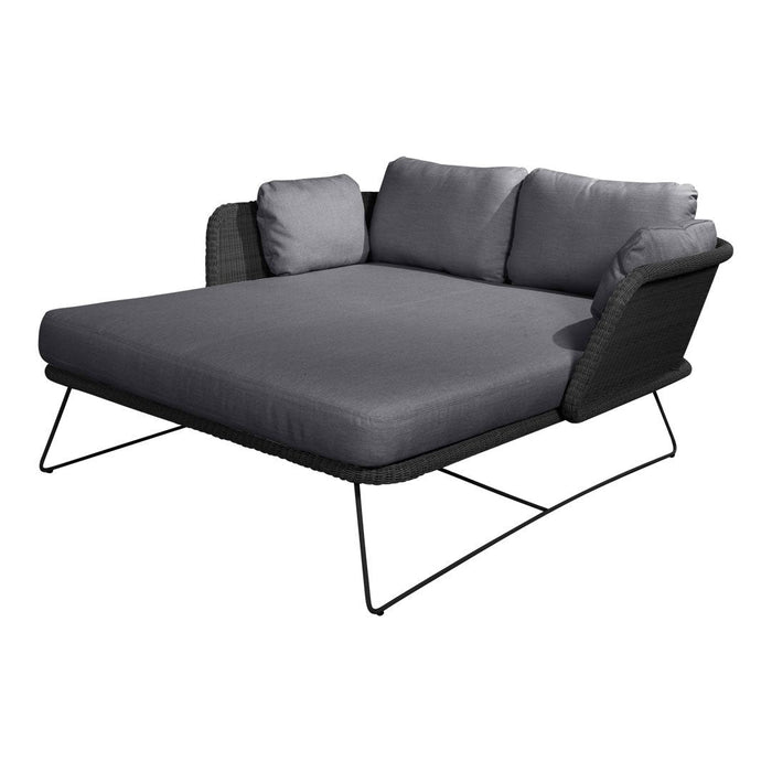 Gray outdoor sofa with sleek black metal frame and plush cushions, featuring a minimalist and modern design.