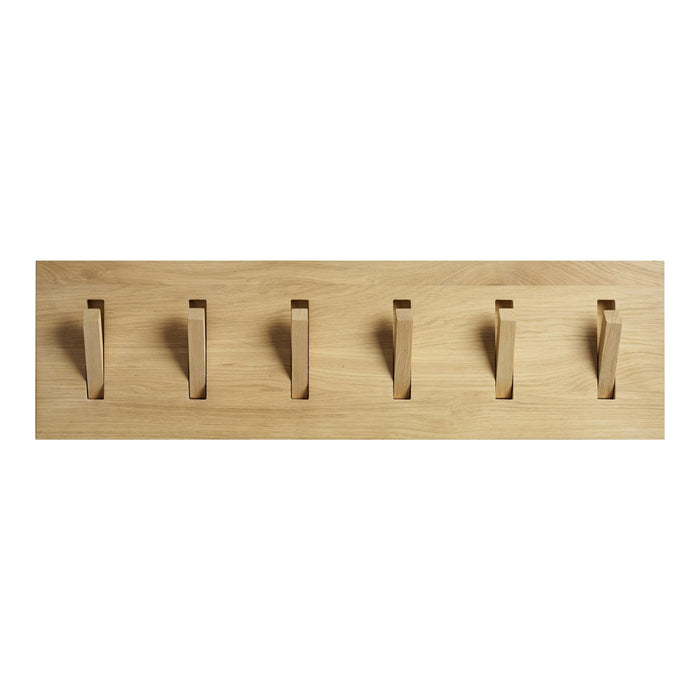 Natural bamboo wall hook rack with a smooth, light wood finish and six minimalist hooks.