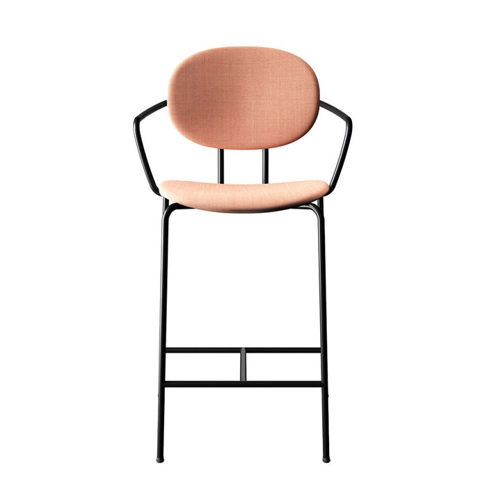 Pink upholstered seat with a textured finish, supported by a sleek black metal frame in a modern design.