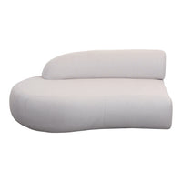 Curved white sofa with a smooth, minimalist design, ideal for modern decor.