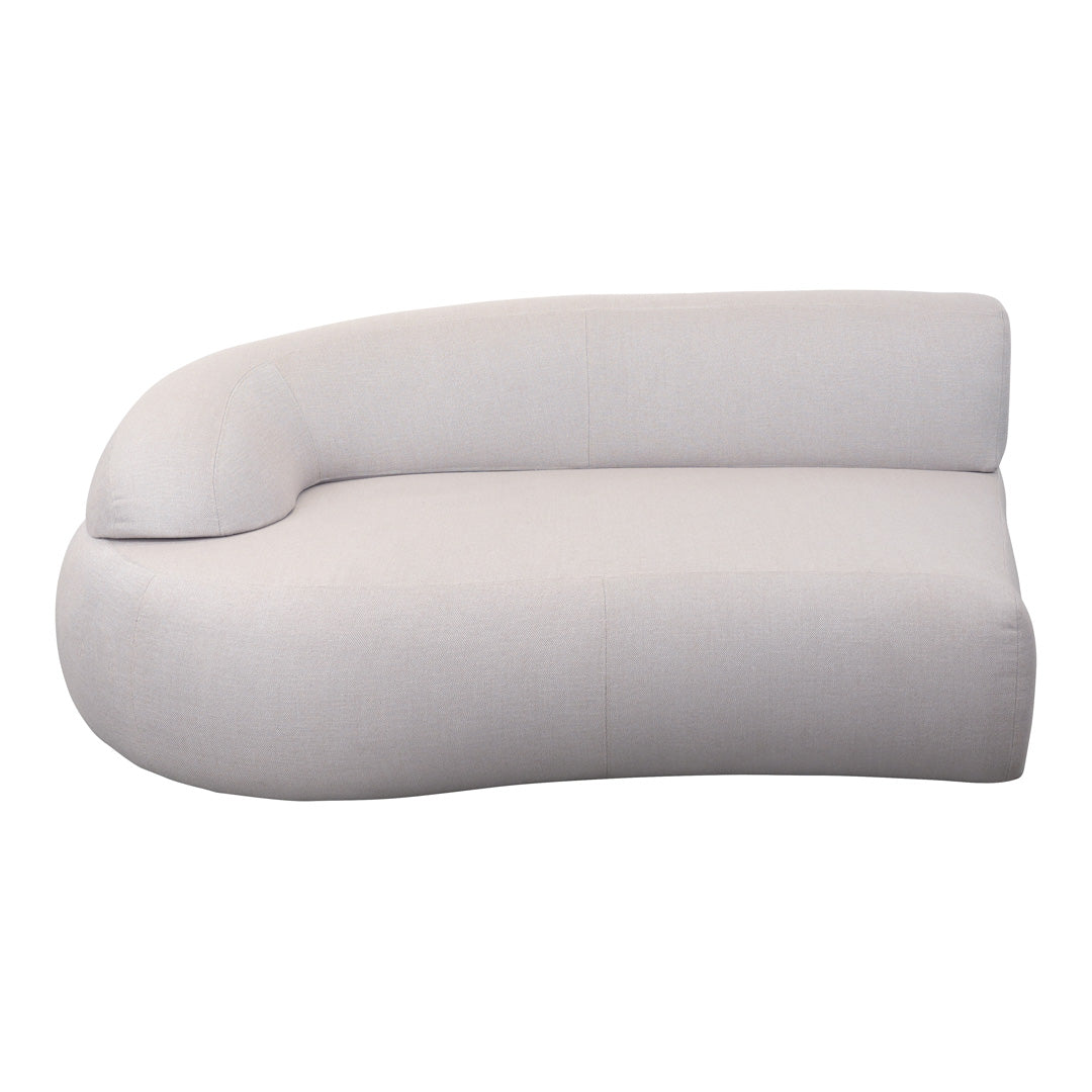 Curved light beige sofa with a smooth, minimalist design and no visible patterns. Ideal for modern interiors.