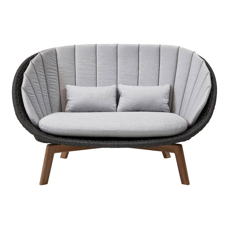 Gray woven fabric two-seater sofa with a sleek black frame and natural wood legs, featuring elegant ribbed patterns.