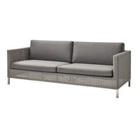 Gray woven sofa with sleek gray cushions and metal accents, perfect for modern outdoor decor.
