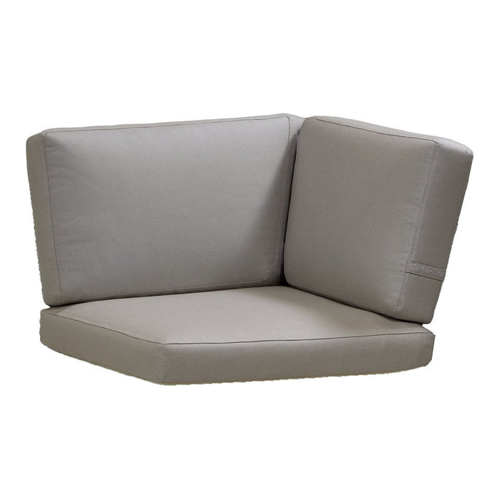 Light gray corner cushion with smooth texture, perfect for modern outdoor furniture setups.