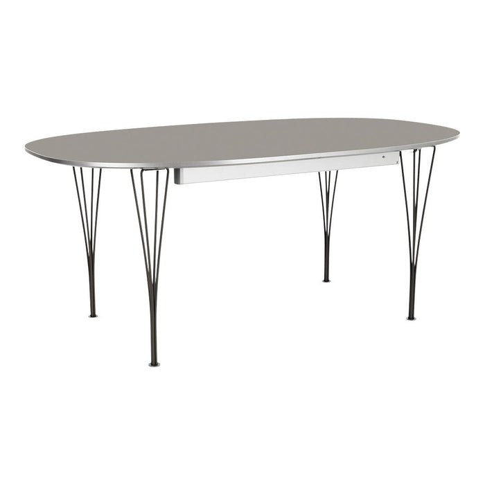 Oval gray tabletop with sleek silver legs, featuring a modern minimalist design. Ideal for contemporary spaces.