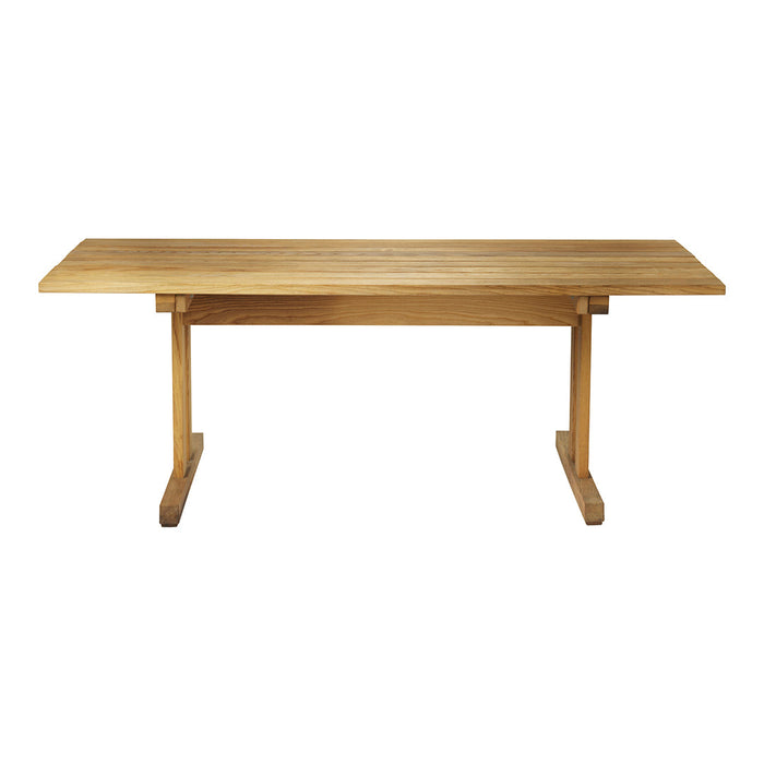 Light wood dining table with a smooth finish and natural grain pattern, perfect for modern and rustic decor.