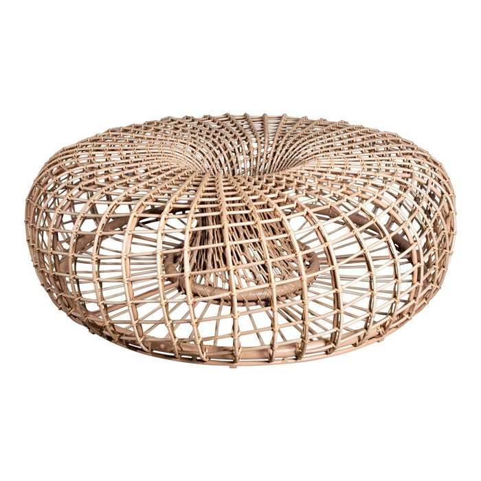 Natural woven rattan ottoman in a round shape with intricate, geometric patterns and a light tan color.