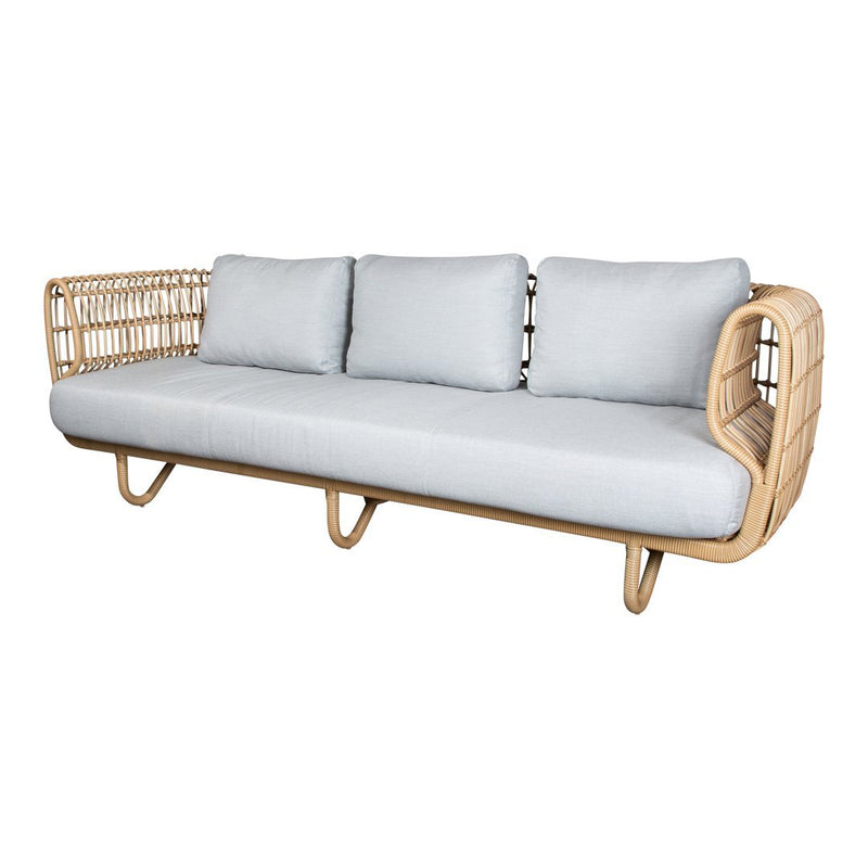 Modern rattan sofa with light gray cushions and a natural wood frame, featuring a minimalist design.