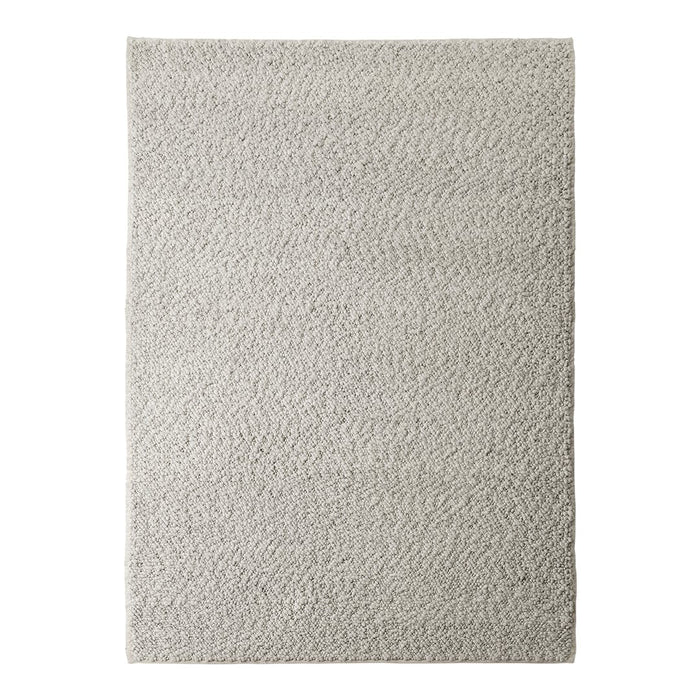 Gray textured rug with a subtle wave pattern, perfect for adding elegance to any space.
