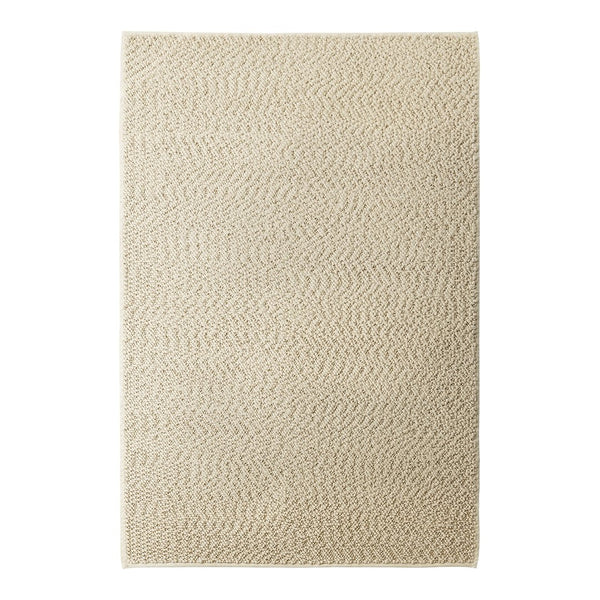 Light beige area rug with subtle zigzag pattern, ideal for neutral-themed interiors.