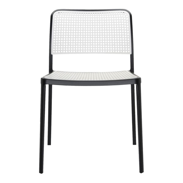 Black metal chair with a white perforated backrest and seat, featuring a modern minimalist design.