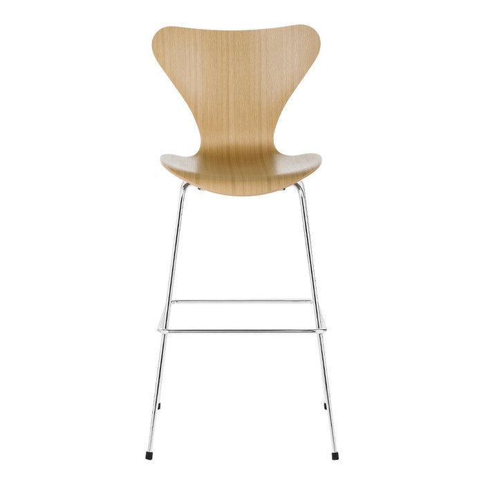 Natural bamboo finish with smooth curves and a sleek, chrome base, creating a modern, minimalist design.