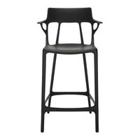 Sleek black bar stool with a modern design featuring smooth curves and a minimalist silhouette. Perfect for any decor.