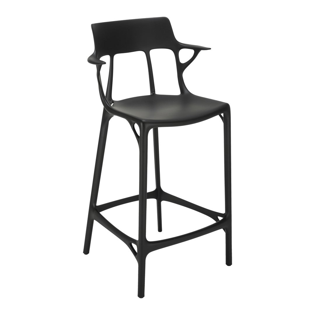 Black modern bar stool with a sleek, minimalist design and unique cut-out patterns. Perfect for contemporary spaces.
