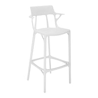 White modern bar stool with a sleek, minimalistic design and unique, contoured patterns. Perfect for any decor.