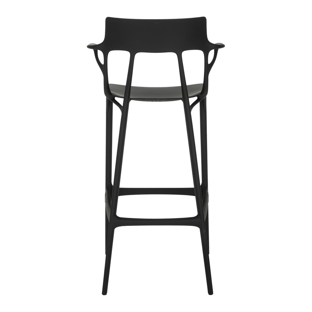 Sleek black bar stool with smooth lines and minimalist design, perfect for modern interiors.