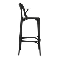 Sleek black bar stool with modern cut-out patterns for a contemporary look. Perfect for stylish dining spaces.