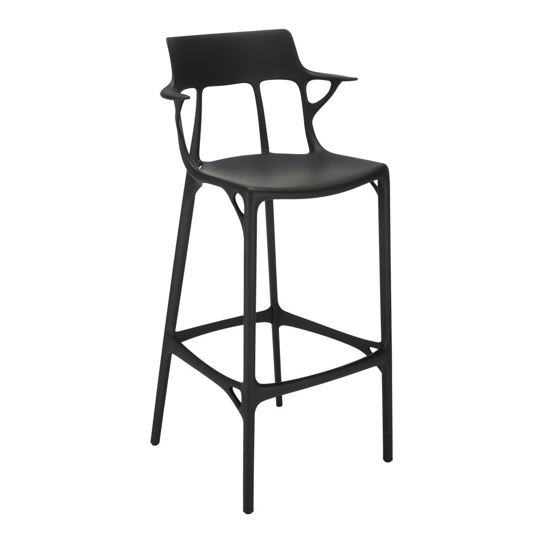 Black modern bar stool with a sleek, minimalist design and organic patterns in the backrest. Perfect for contemporary spaces.