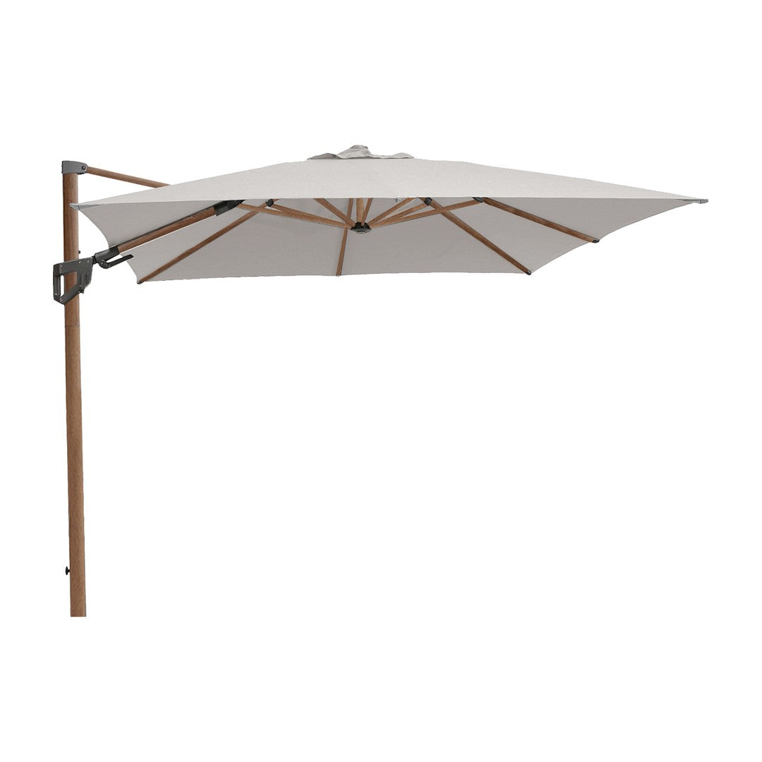 White cantilever patio umbrella with a wooden frame and a sleek black base. Stylish, modern design for outdoor use.