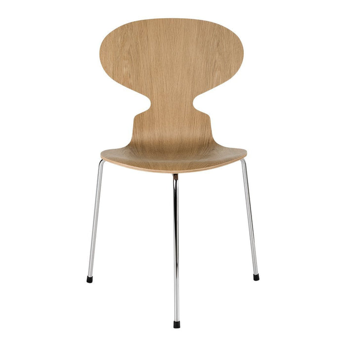 Natural wood finish with a smooth texture and minimalist design; sleek chrome legs enhance modern aesthetic.