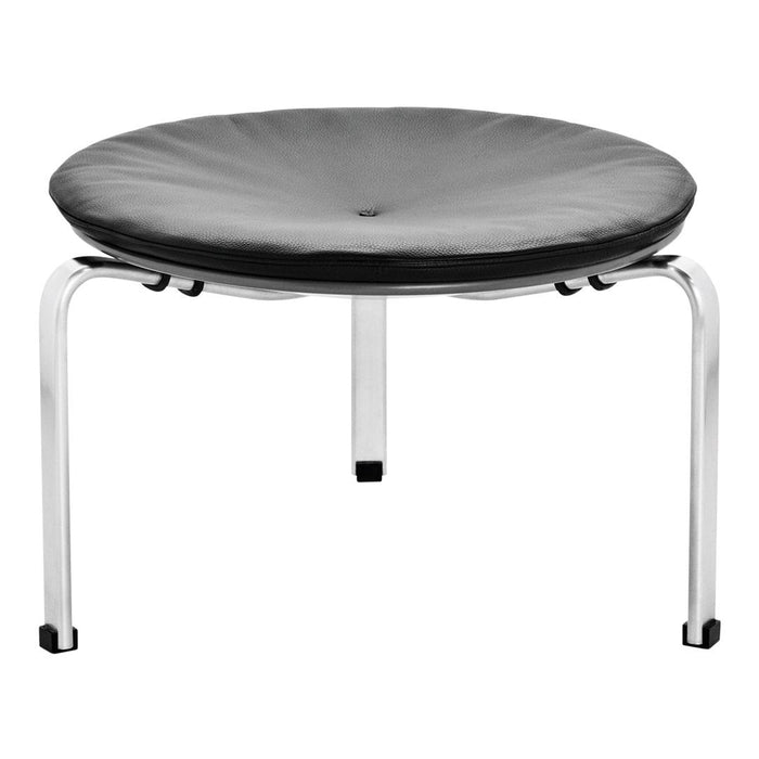 Round black cushion stool with sleek chrome legs, featuring a subtle tufted pattern for added texture.
