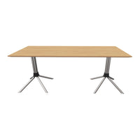Light oak tabletop with a smooth finish and sleek silver legs, perfect for modern interiors.