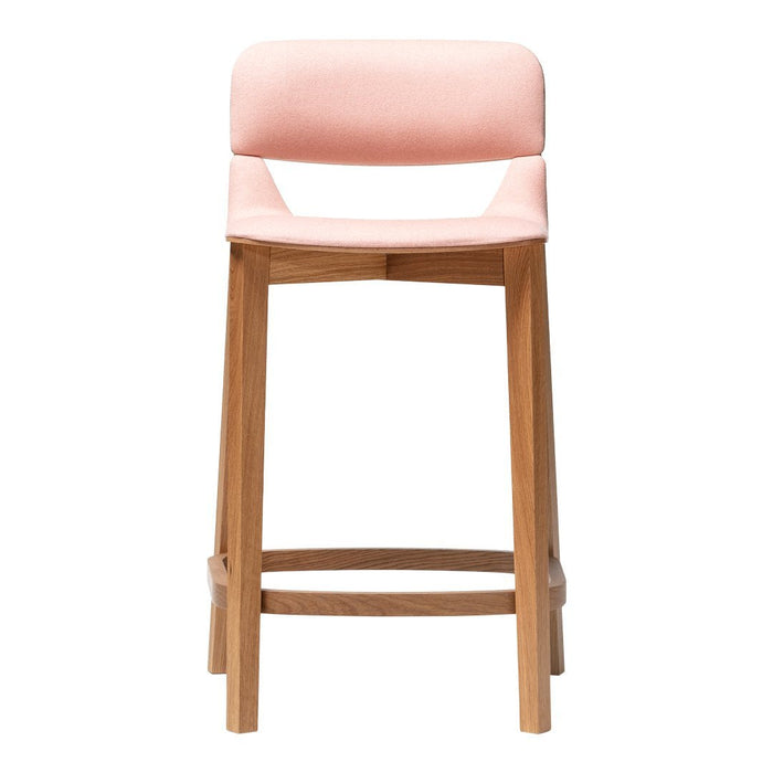 Stylish pink upholstered bar stool with a natural wood frame, perfect for modern home décor.