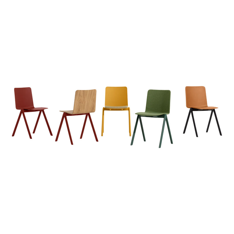 Set of five colorful chairs: red, natural wood, yellow, green, and orange, with simple, modern designs.