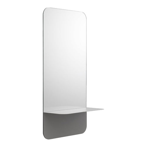 Minimalist rectangular mirror with a sleek silver frame and a smooth white shelf below. Clean, modern design.