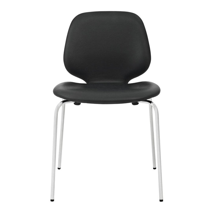 Black chair with a smooth finish and minimalist design, featuring sleek chrome legs. Ideal for modern interiors.