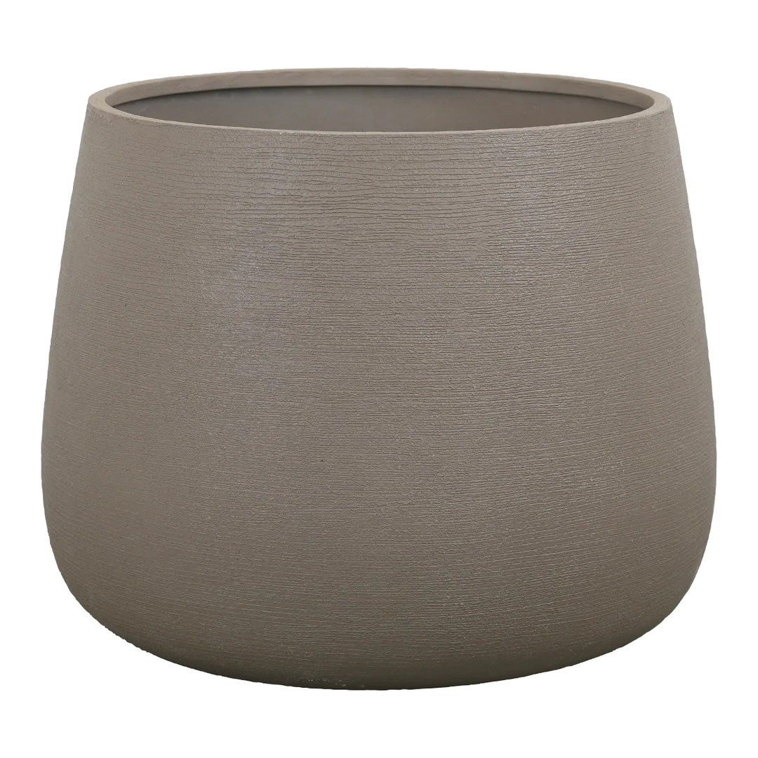 "Round beige planter with a subtle textured finish, perfect for modern decor."