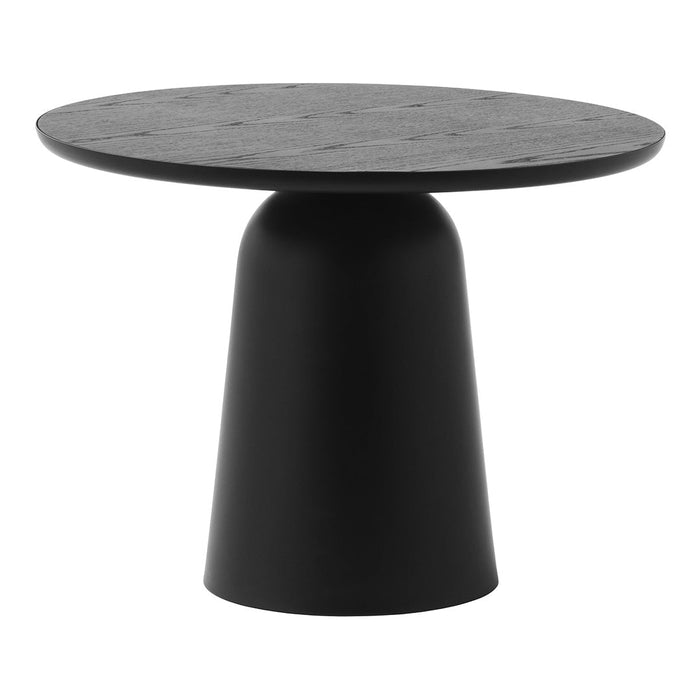 Black round table with a textured surface and a smooth, tapered base, creating a modern and minimalist look.