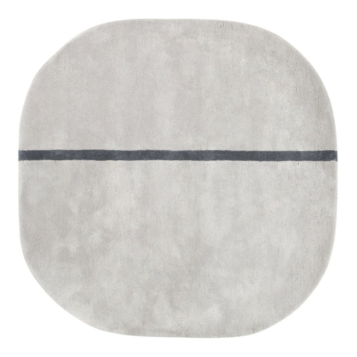Soft gray round rug with a subtle texture and a dark gray horizontal line pattern. Perfect for modern decor.